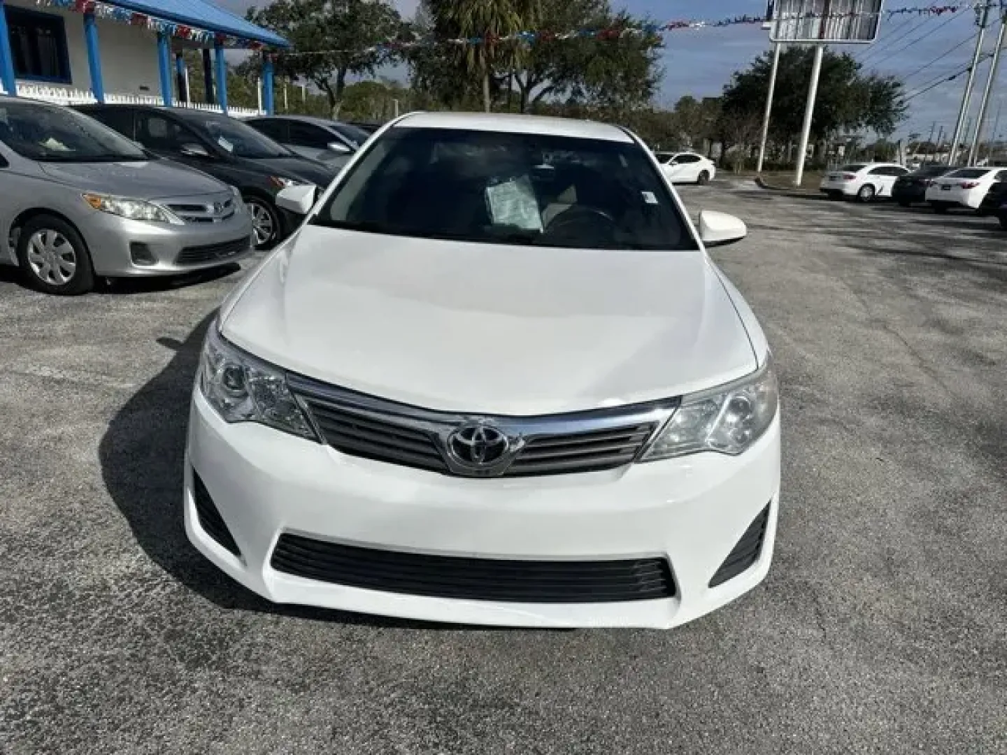 2014 Toyota Camry (4T1BF1FK5EU) with an Other engine, AUTOMATIC transmission, located at 8829 US Hwy 19, Port Richey, FL, 34668, (727) 264-1107, 28.285917, -82.717346 - **Experience Comfort and Reliability with the 2014 Toyota Camry from Byrider Florida #162!**<br /> <br /> Are you looking for a dependable vehicle that can seamlessly adapt to your busy lifestyle? The 2014 Toyota Camry is the perfect choice for anyone from growing families to commuters navigating th - Photo#0