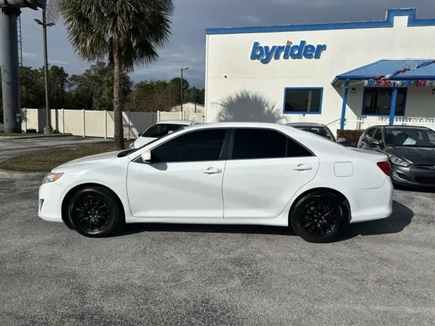 2014 Toyota Camry (4T1BF1FK5EU) with an Other engine, AUTOMATIC transmission, located at 8829 US Hwy 19, Port Richey, FL, 34668, (727) 264-1107, 28.285917, -82.717346 - **Experience Comfort and Reliability with the 2014 Toyota Camry from Byrider Florida #162!**<br /> <br /> Are you looking for a dependable vehicle that can seamlessly adapt to your busy lifestyle? The 2014 Toyota Camry is the perfect choice for anyone from growing families to commuters navigating th - Photo#1
