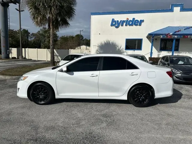2014 Toyota Camry (4T1BF1FK5EU) with an Other engine, AUTOMATIC transmission, located at 8829 US Hwy 19, Port Richey, FL, 34668, (727) 264-1107, 28.285917, -82.717346 - **Experience Comfort and Reliability with the 2014 Toyota Camry from Byrider Florida #162!**<br /> <br /> Are you looking for a dependable vehicle that can seamlessly adapt to your busy lifestyle? The 2014 Toyota Camry is the perfect choice for anyone from growing families to commuters navigating th - Photo#1
