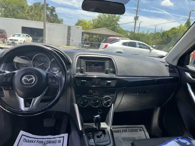 2013 Mazda CX-5 (JM3KE2CEXD0) with an Other engine, AUTOMATIC transmission, located at 1285 Cassat Ave, Jacksonville, FL, 32205, (904) 425-3000, 30.299780, -81.732430 - **Discover Your Next Adventure with the 2013 Mazda CX-5 at Byrider Florida #139**<br /> <br /> Are you seeking a reliable vehicle that can keep up with your busy lifestyle, whether you're commuting to work, running errands, or embarking on weekend adventures? The 2013 Mazda CX-5 is the perfect SUV f - Photo#9