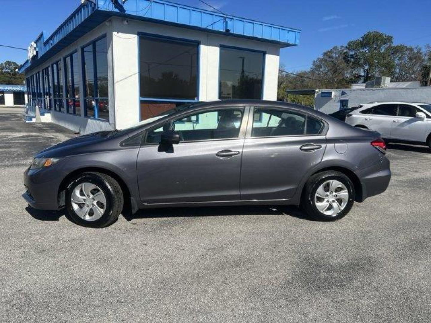 2015 Honda Civic Sedan (19XFB2F51FE) with an Other engine, AUTOMATIC transmission, located at 1285 Cassat Ave, Jacksonville, FL, 32205, (904) 425-3000, 30.299780, -81.732430 - IIHS Top Safety Pick. Only 119,277 Miles! Scores 39 Highway MPG and 30 City MPG! This Honda Civic Sedan boasts a Regular Unleaded I-4 1.8 L/110 engine powering this Variable transmission. Window Grid Antenna, Wheels: 15 w/Full Covers, VSA Electronic Stability Control (ESC).*This Honda Civic Sedan Co - Photo#2