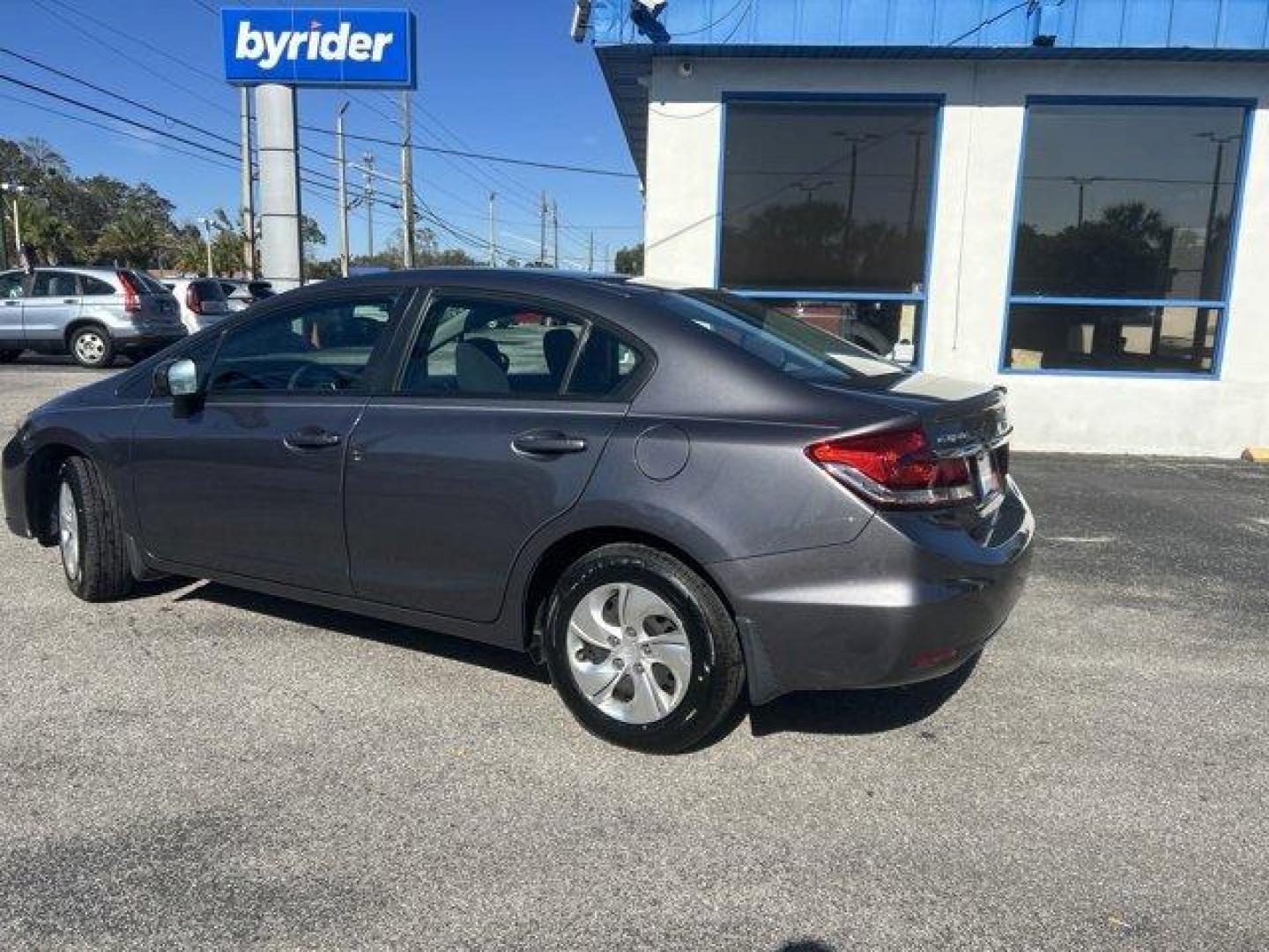 2015 Honda Civic Sedan (19XFB2F51FE) with an Other engine, AUTOMATIC transmission, located at 1285 Cassat Ave, Jacksonville, FL, 32205, (904) 425-3000, 30.299780, -81.732430 - IIHS Top Safety Pick. Only 119,277 Miles! Scores 39 Highway MPG and 30 City MPG! This Honda Civic Sedan boasts a Regular Unleaded I-4 1.8 L/110 engine powering this Variable transmission. Window Grid Antenna, Wheels: 15 w/Full Covers, VSA Electronic Stability Control (ESC).*This Honda Civic Sedan Co - Photo#3