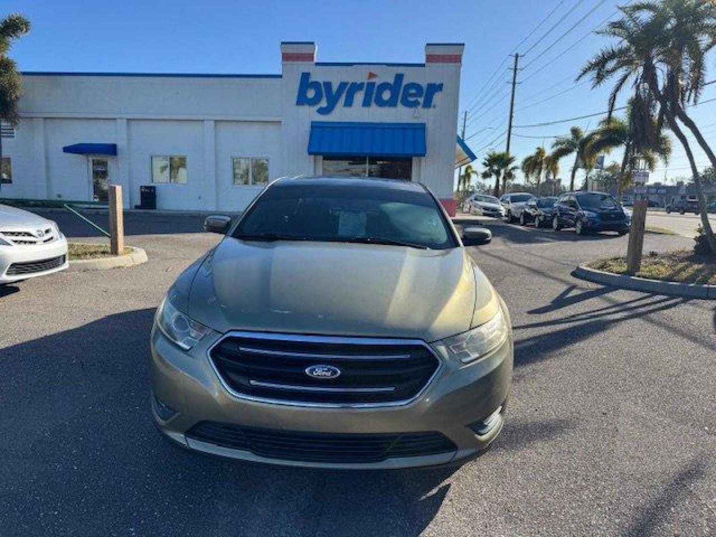 2013 Ford Taurus (1FAHP2E8XDG) with an Other engine, AUTOMATIC transmission, located at 7701 Park Blvd., Pinellas Park, FL, 33781, (727) 369-7777, 27.839552, -82.747284 - Ward's 10 Best Engines. Boasts 29 Highway MPG and 19 City MPG! This Ford Taurus delivers a Gas V6 3.5L/213 engine powering this Automatic transmission. Vinyl-wrapped front center console -inc: armrest, front covered cupholders/storage bin, removable trinket tray, painted appliques, Torque vectoring - Photo#1