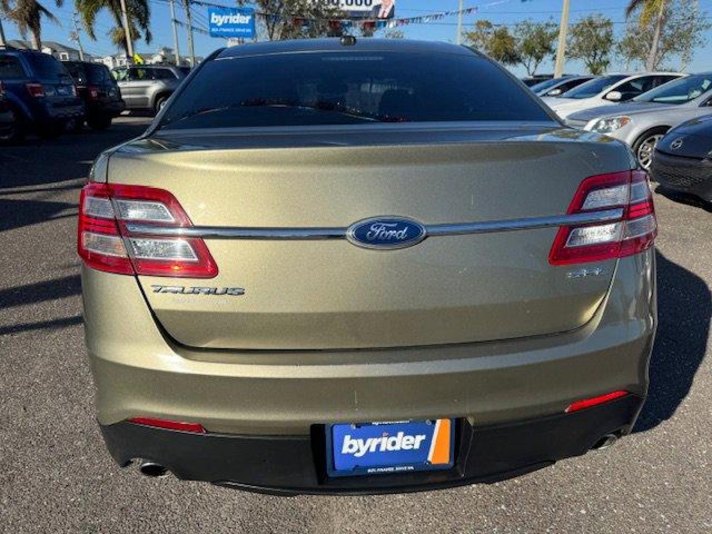 2013 Ford Taurus (1FAHP2E8XDG) with an Other engine, AUTOMATIC transmission, located at 7701 Park Blvd., Pinellas Park, FL, 33781, (727) 369-7777, 27.839552, -82.747284 - Ward's 10 Best Engines. Boasts 29 Highway MPG and 19 City MPG! This Ford Taurus delivers a Gas V6 3.5L/213 engine powering this Automatic transmission. Vinyl-wrapped front center console -inc: armrest, front covered cupholders/storage bin, removable trinket tray, painted appliques, Torque vectoring - Photo#3