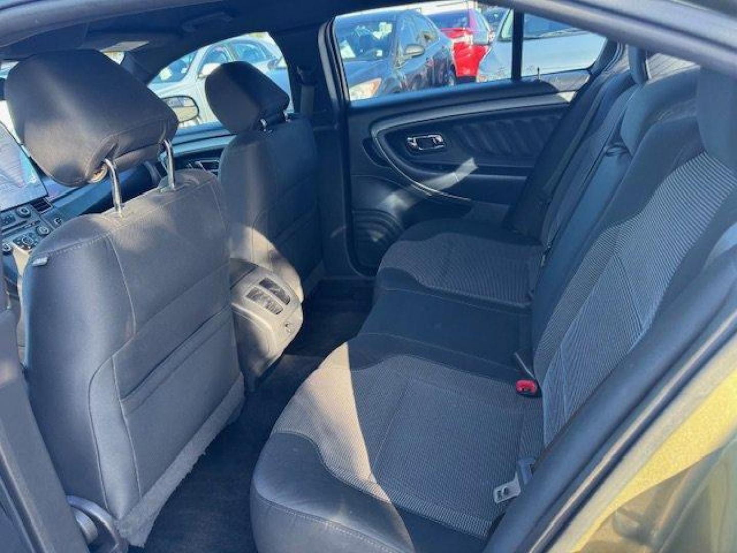 2013 Ford Taurus (1FAHP2E8XDG) with an Other engine, AUTOMATIC transmission, located at 7701 Park Blvd., Pinellas Park, FL, 33781, (727) 369-7777, 27.839552, -82.747284 - Ward's 10 Best Engines. Boasts 29 Highway MPG and 19 City MPG! This Ford Taurus delivers a Gas V6 3.5L/213 engine powering this Automatic transmission. Vinyl-wrapped front center console -inc: armrest, front covered cupholders/storage bin, removable trinket tray, painted appliques, Torque vectoring - Photo#5