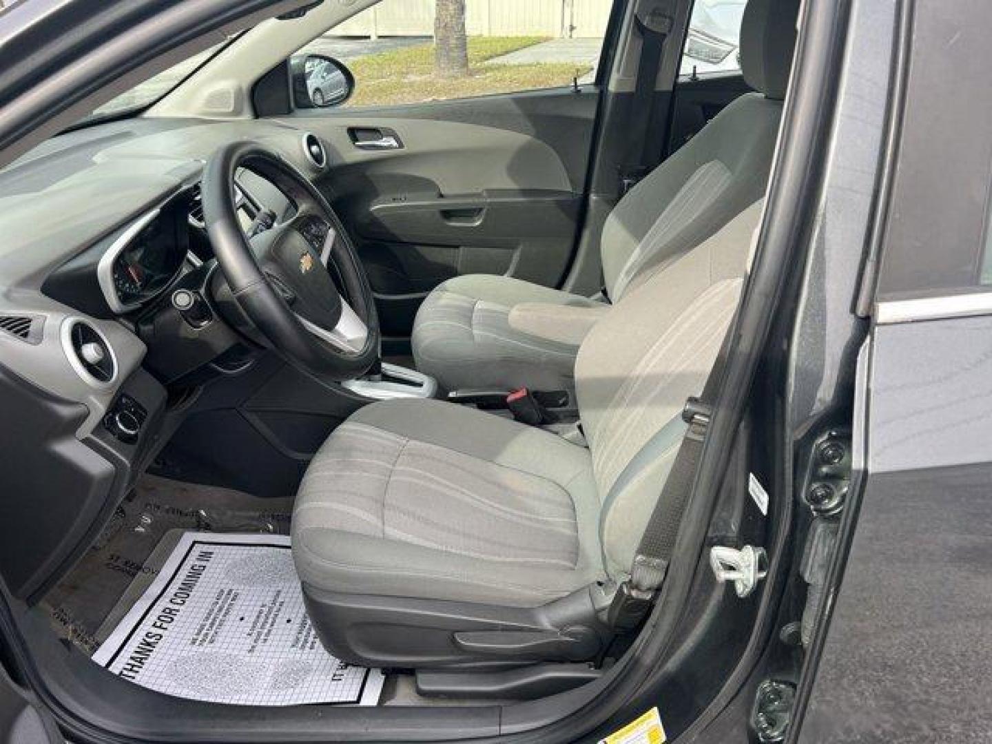 2017 Chevrolet Sonic (1G1JD5SHXH4) with an Other engine, AUTOMATIC transmission, located at 8829 US Hwy 19, Port Richey, FL, 34668, (727) 264-1107, 28.285917, -82.717346 - KBB.com 10 Coolest New Cars Under $18,000. Delivers 34 Highway MPG and 24 City MPG! This Chevrolet Sonic delivers a Gas I4 1.8L/110 engine powering this Automatic transmission. Wipers, front intermittent, variable, Windows, power with driver and front passenger Express-Up and Express-Down on all, Wh - Photo#8