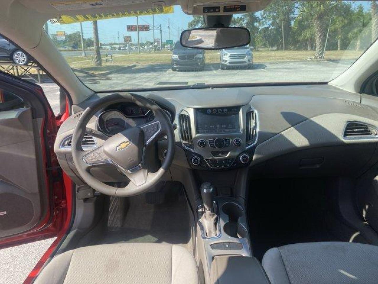 2016 Chevrolet Cruze (1G1BE5SM4G7) with an Other engine, AUTOMATIC transmission, located at 8829 US Hwy 19, Port Richey, FL, 34668, (727) 264-1107, 28.285917, -82.717346 - KBB.com 10 Most Comfortable Cars Under $30,000. Scores 42 Highway MPG and 30 City MPG! This Chevrolet Cruze boasts a Turbocharged Gas I4 1.4L/ engine powering this Automatic transmission. VISORS, DRIVER AND FRONT PASSENGER ILLUMINATED VANITY MIRRORS, TRANSMISSION, 6-SPEED AUTOMATIC, TIRES, 205/55R16 - Photo#8