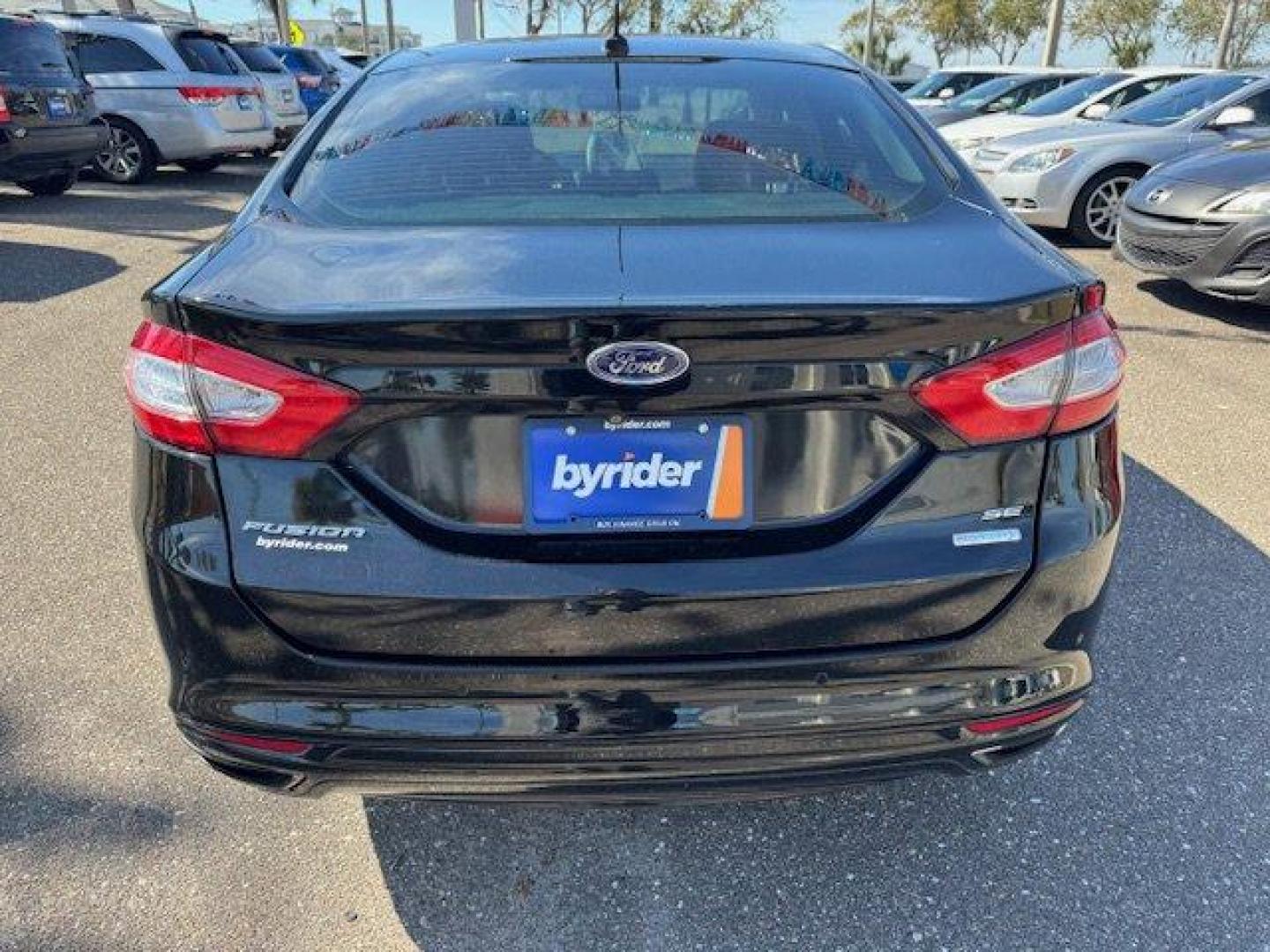 2016 Ford Fusion (3FA6P0H91GR) with an Other engine, AUTOMATIC transmission, located at 7701 Park Blvd., Pinellas Park, FL, 33781, (727) 369-7777, 27.839552, -82.747284 - KBB.com 10 Best Sedans Under $25,000. Only 99,967 Miles! Scores 33 Highway MPG and 22 City MPG! This Ford Fusion delivers a Intercooled Turbo Regular Unleaded I-4 2.0 L/122 engine powering this Automatic transmission. Wheels: 17 Painted Aluminum, Wheels w/Painted Accents, Trunk Rear Cargo Access.* T - Photo#3