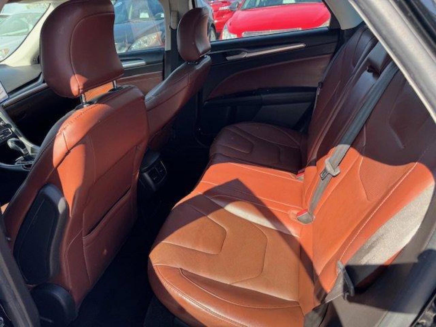 2016 Ford Fusion (3FA6P0H91GR) with an Other engine, AUTOMATIC transmission, located at 7701 Park Blvd., Pinellas Park, FL, 33781, (727) 369-7777, 27.839552, -82.747284 - KBB.com 10 Best Sedans Under $25,000. Only 99,967 Miles! Scores 33 Highway MPG and 22 City MPG! This Ford Fusion delivers a Intercooled Turbo Regular Unleaded I-4 2.0 L/122 engine powering this Automatic transmission. Wheels: 17 Painted Aluminum, Wheels w/Painted Accents, Trunk Rear Cargo Access.* T - Photo#5