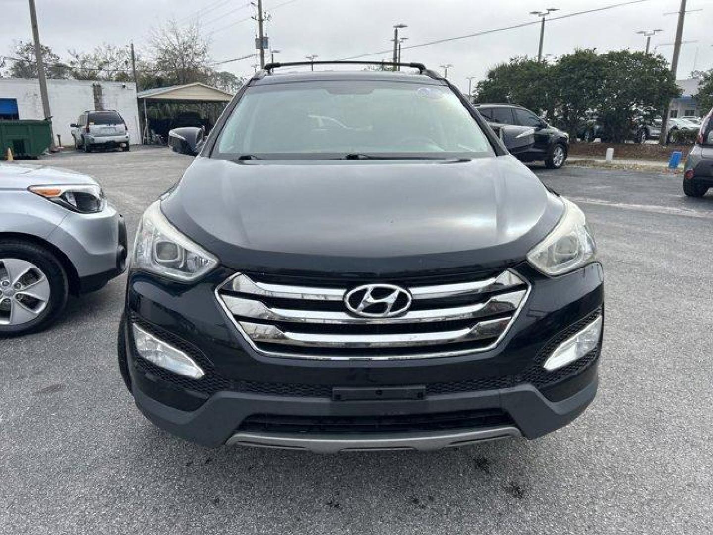 2013 Hyundai Santa Fe (5XYZU3LA1DG) with an Other engine, AUTOMATIC transmission, located at 1285 Cassat Ave, Jacksonville, FL, 32205, (904) 425-3000, 30.299780, -81.732430 - IIHS Top Safety Pick. Only 125,462 Miles! Boasts 27 Highway MPG and 20 City MPG! This Hyundai Santa Fe delivers a Turbocharged Gas I4 2.0L/122 engine powering this Automatic transmission. TWILIGHT BLACK, ROOF RACK CROSS BARS, MUDGUARDS.* This Hyundai Santa Fe Features the Following Options *LEATHER - Photo#1