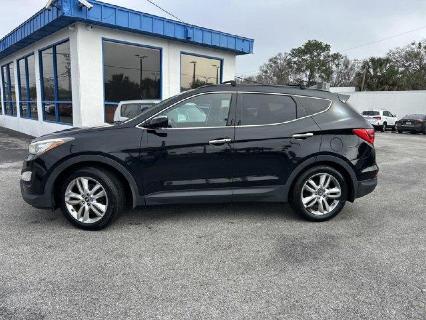 2013 Hyundai Santa Fe (5XYZU3LA1DG) with an Other engine, AUTOMATIC transmission, located at 1285 Cassat Ave, Jacksonville, FL, 32205, (904) 425-3000, 30.299780, -81.732430 - IIHS Top Safety Pick. Only 125,462 Miles! Boasts 27 Highway MPG and 20 City MPG! This Hyundai Santa Fe delivers a Turbocharged Gas I4 2.0L/122 engine powering this Automatic transmission. TWILIGHT BLACK, ROOF RACK CROSS BARS, MUDGUARDS.* This Hyundai Santa Fe Features the Following Options *LEATHER - Photo#2