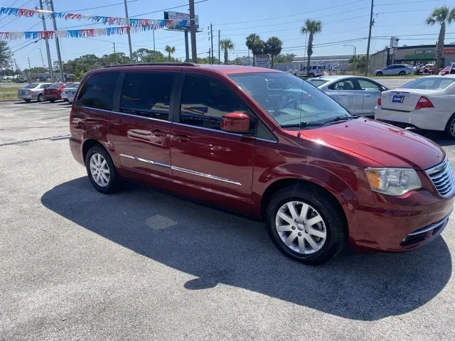 2014 Chrysler Town and Country (2C4RC1BG1ER) with an Other engine, AUTOMATIC transmission, located at 8829 US Hwy 19, Port Richey, FL, 34668, (727) 264-1107, 28.285917, -82.717346 - **Discover Your Family's Next Adventure with the 2014 Chrysler Town and Country at Byrider Florida #162!**<br /> <br /> Are you looking for a reliable and spacious vehicle that's perfect for family road trips, weekend getaways, or those busy weekday commutes? Look no further! The 2014 Chrysler Town - Photo#2