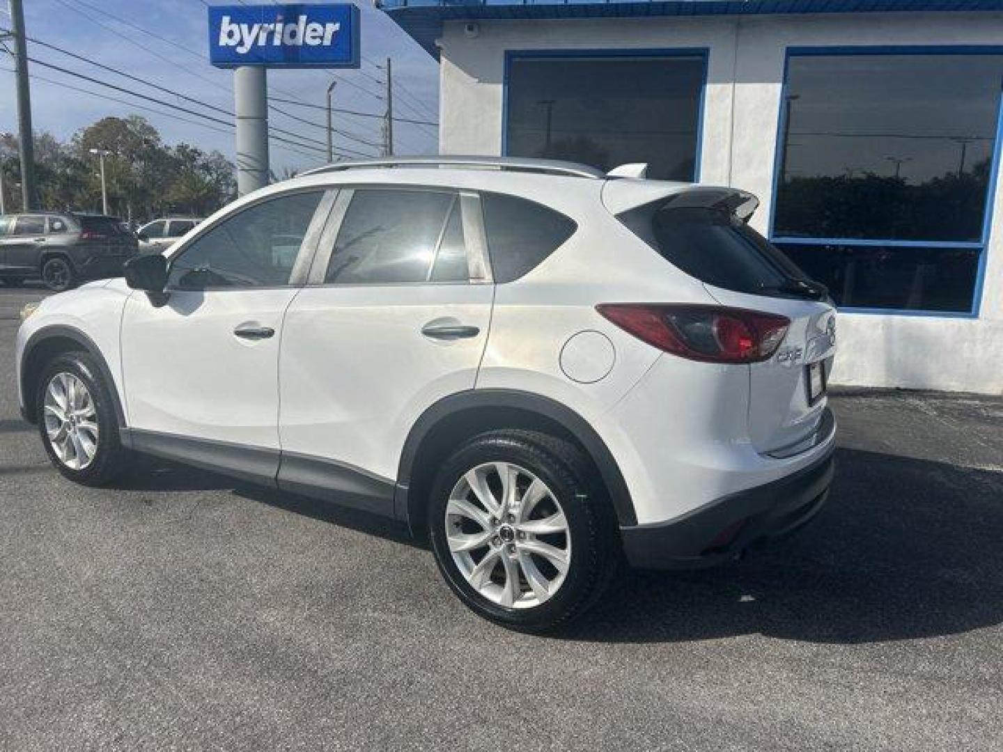 2013 Mazda CX-5 (JM3KE2DE8D0) with an Other engine, AUTOMATIC transmission, located at 1285 Cassat Ave, Jacksonville, FL, 32205, (904) 425-3000, 30.299780, -81.732430 - IIHS Top Safety Pick. Only 105,869 Miles! Delivers 32 Highway MPG and 26 City MPG! This Mazda CX-5 delivers a Gas I4 2.0L/122 engine powering this Automatic transmission. WHEEL LOCKS, SAND, LEATHER SEAT TRIM, ROOF RACK SIDE RAILS.*This Mazda CX-5 Comes Equipped with These Options *GT TECH PKG -inc: - Photo#3