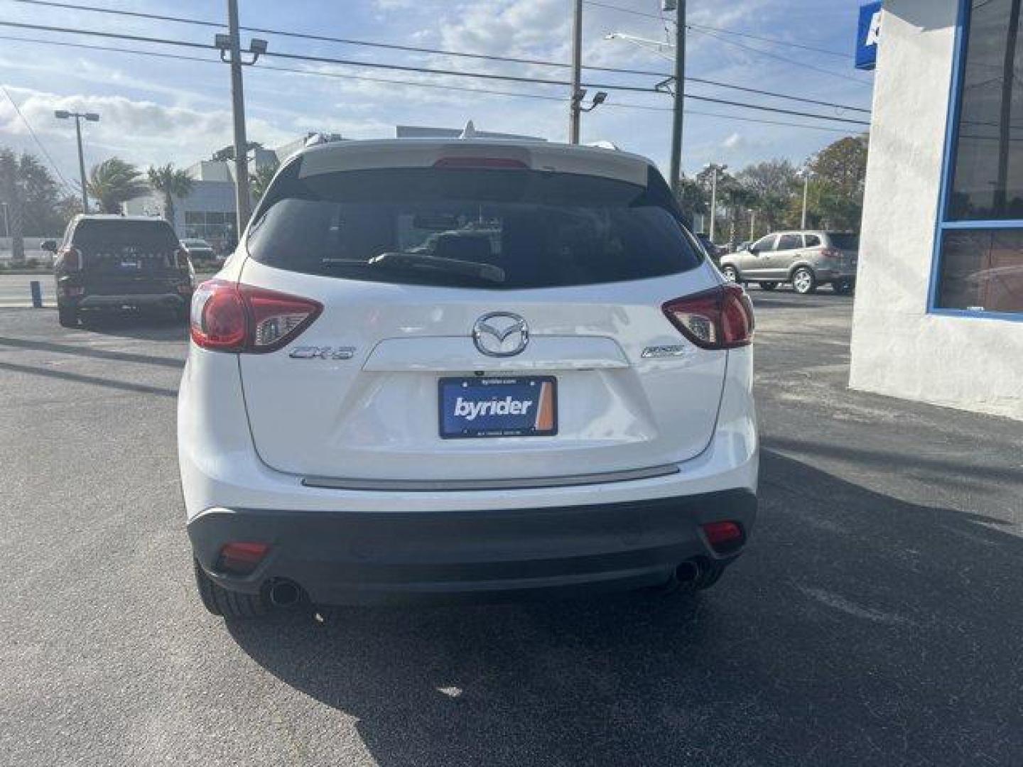 2013 Mazda CX-5 (JM3KE2DE8D0) with an Other engine, AUTOMATIC transmission, located at 1285 Cassat Ave, Jacksonville, FL, 32205, (904) 425-3000, 30.299780, -81.732430 - IIHS Top Safety Pick. Only 105,869 Miles! Delivers 32 Highway MPG and 26 City MPG! This Mazda CX-5 delivers a Gas I4 2.0L/122 engine powering this Automatic transmission. WHEEL LOCKS, SAND, LEATHER SEAT TRIM, ROOF RACK SIDE RAILS.*This Mazda CX-5 Comes Equipped with These Options *GT TECH PKG -inc: - Photo#4