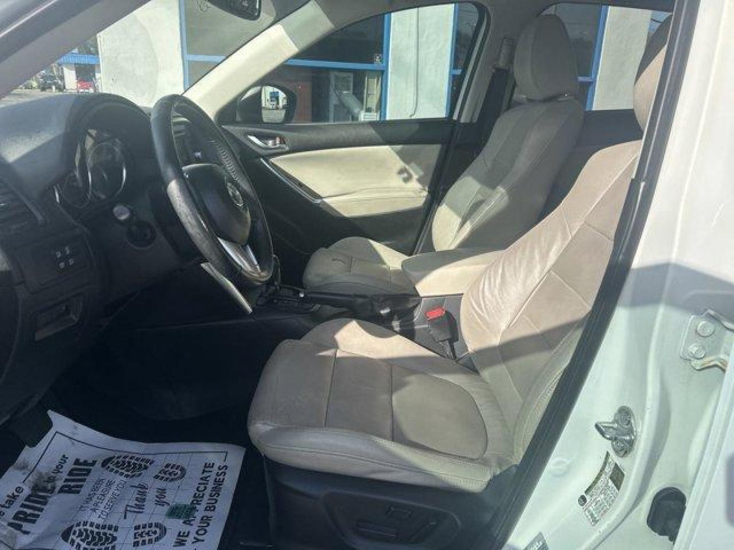 2013 Mazda CX-5 (JM3KE2DE8D0) with an Other engine, AUTOMATIC transmission, located at 1285 Cassat Ave, Jacksonville, FL, 32205, (904) 425-3000, 30.299780, -81.732430 - IIHS Top Safety Pick. Only 105,869 Miles! Delivers 32 Highway MPG and 26 City MPG! This Mazda CX-5 delivers a Gas I4 2.0L/122 engine powering this Automatic transmission. WHEEL LOCKS, SAND, LEATHER SEAT TRIM, ROOF RACK SIDE RAILS.*This Mazda CX-5 Comes Equipped with These Options *GT TECH PKG -inc: - Photo#8