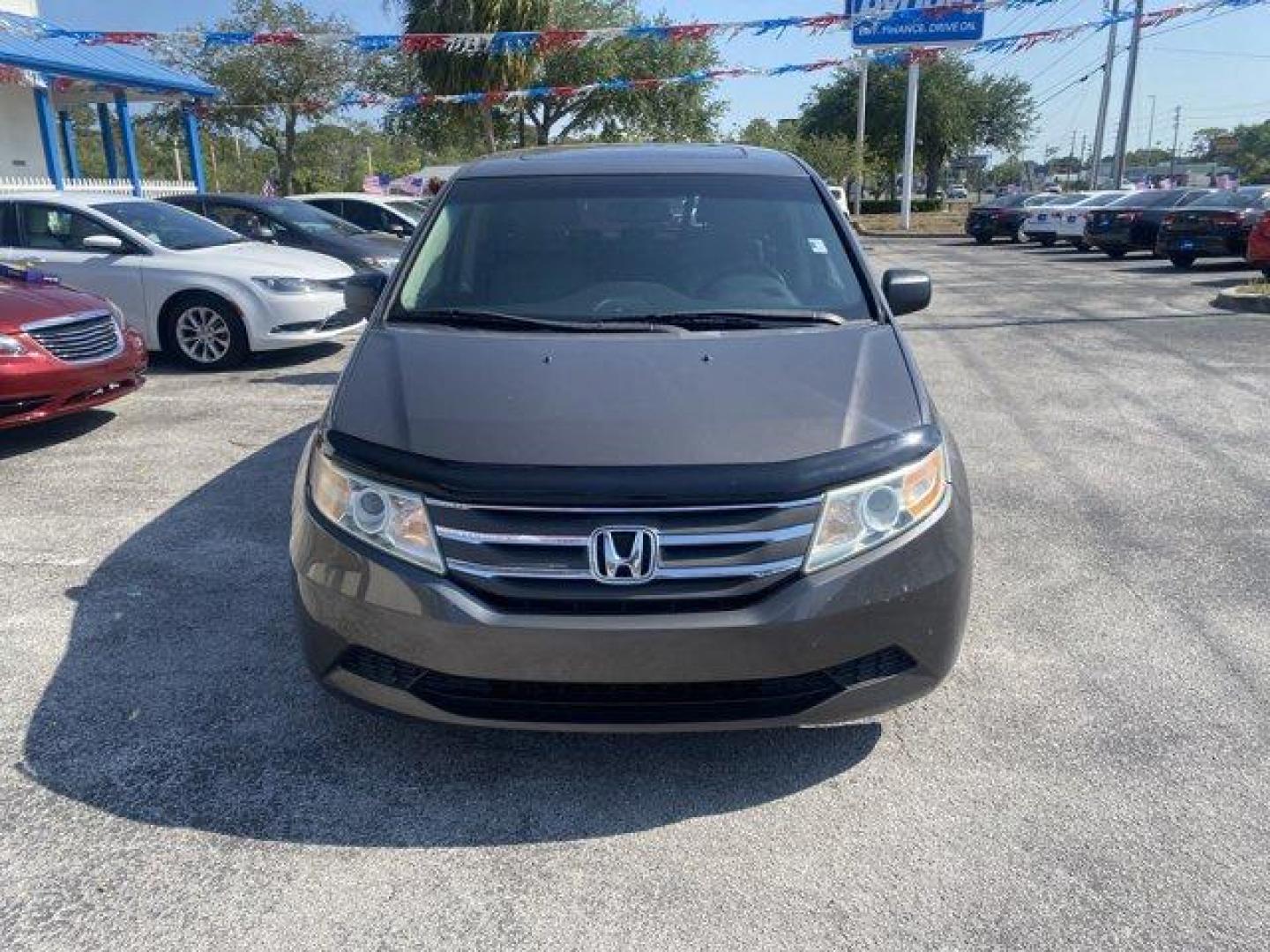 2013 Honda Odyssey (5FNRL5H66DB) with an Other engine, AUTOMATIC transmission, located at 8829 US Hwy 19, Port Richey, FL, 34668, (727) 264-1107, 28.285917, -82.717346 - KBB.com 10 Best Family Cars. Delivers 27 Highway MPG and 18 City MPG! This Honda Odyssey boasts a Gas V6 3.5L/212 engine powering this Automatic transmission. XM Radio (subscription required), Wide-mode adjustable 2nd-row seats -inc: leather trimmed outboard seats, multi-function center seat, walk-i - Photo#0