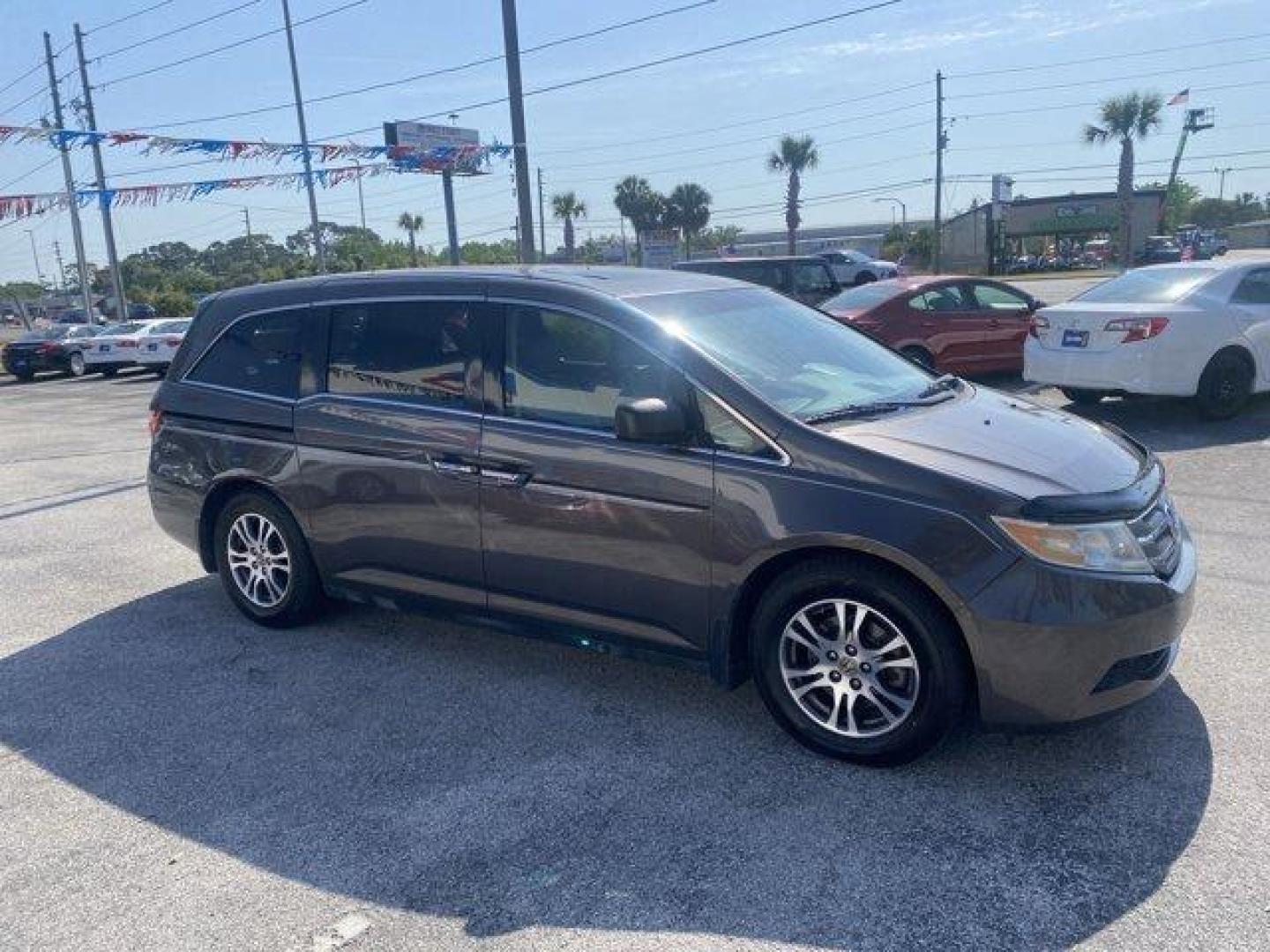 2013 Honda Odyssey (5FNRL5H66DB) with an Other engine, AUTOMATIC transmission, located at 8829 US Hwy 19, Port Richey, FL, 34668, (727) 264-1107, 28.285917, -82.717346 - KBB.com 10 Best Family Cars. Delivers 27 Highway MPG and 18 City MPG! This Honda Odyssey boasts a Gas V6 3.5L/212 engine powering this Automatic transmission. XM Radio (subscription required), Wide-mode adjustable 2nd-row seats -inc: leather trimmed outboard seats, multi-function center seat, walk-i - Photo#1
