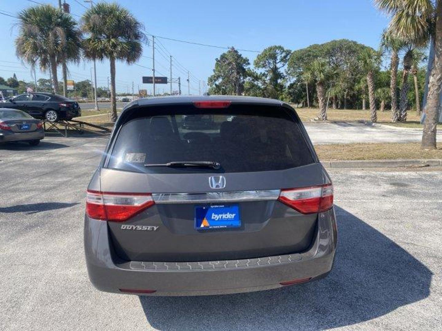2013 Honda Odyssey (5FNRL5H66DB) with an Other engine, AUTOMATIC transmission, located at 8829 US Hwy 19, Port Richey, FL, 34668, (727) 264-1107, 28.285917, -82.717346 - KBB.com 10 Best Family Cars. Delivers 27 Highway MPG and 18 City MPG! This Honda Odyssey boasts a Gas V6 3.5L/212 engine powering this Automatic transmission. XM Radio (subscription required), Wide-mode adjustable 2nd-row seats -inc: leather trimmed outboard seats, multi-function center seat, walk-i - Photo#3