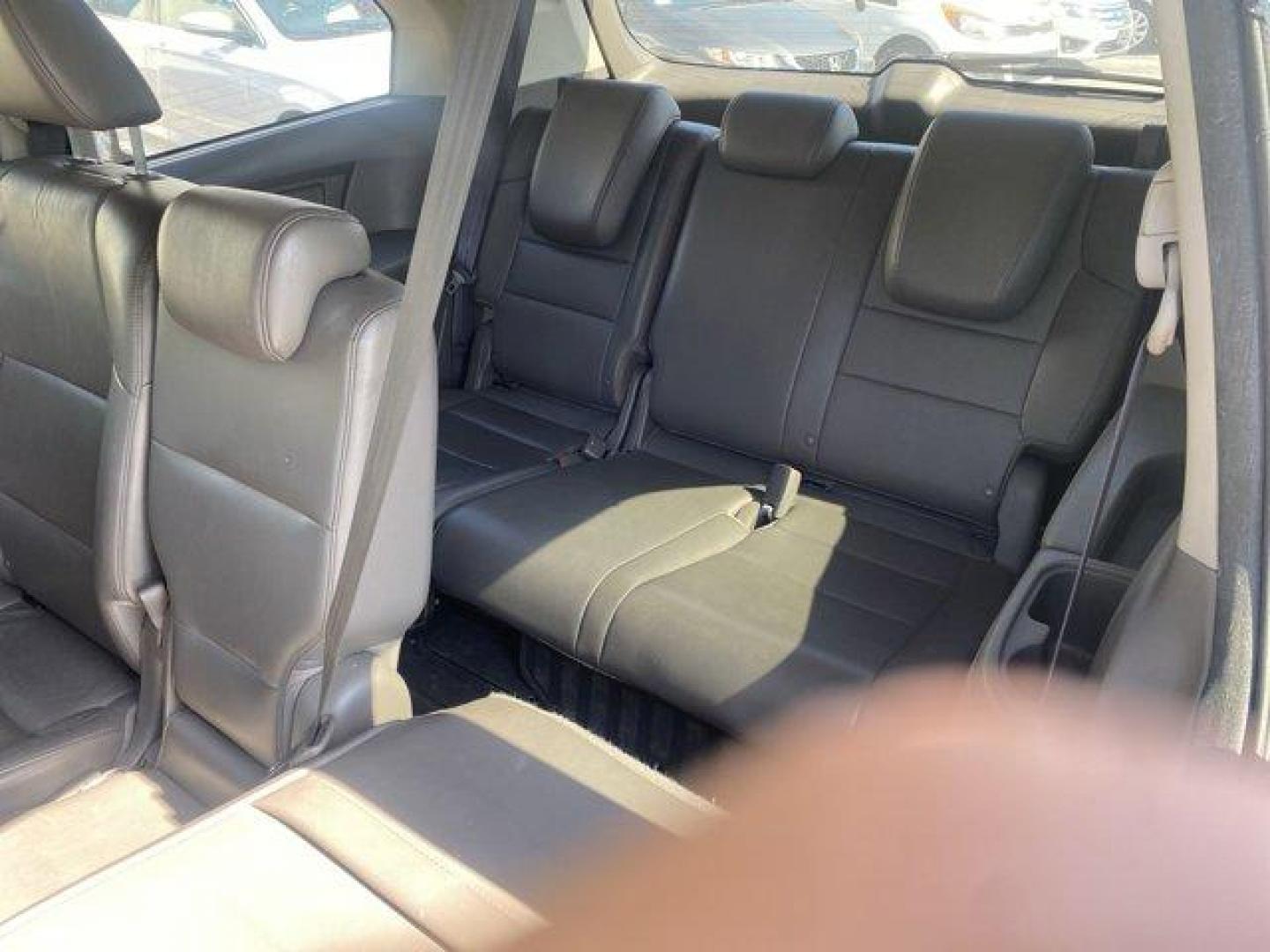 2013 Honda Odyssey (5FNRL5H66DB) with an Other engine, AUTOMATIC transmission, located at 8829 US Hwy 19, Port Richey, FL, 34668, (727) 264-1107, 28.285917, -82.717346 - KBB.com 10 Best Family Cars. Delivers 27 Highway MPG and 18 City MPG! This Honda Odyssey boasts a Gas V6 3.5L/212 engine powering this Automatic transmission. XM Radio (subscription required), Wide-mode adjustable 2nd-row seats -inc: leather trimmed outboard seats, multi-function center seat, walk-i - Photo#6