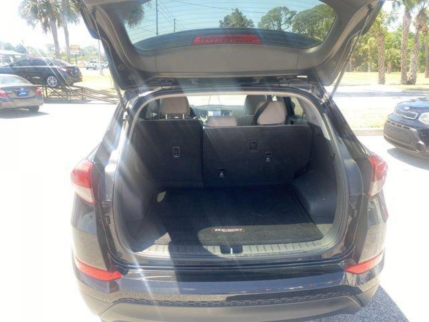2016 Hyundai Tucson (KM8J33A40GU) with an Other engine, AUTOMATIC transmission, located at 8829 US Hwy 19, Port Richey, FL, 34668, (727) 264-1107, 28.285917, -82.717346 - IIHS Top Safety Pick+, Top Safety Pick+. Only 96,973 Miles! Scores 31 Highway MPG and 23 City MPG! This Hyundai Tucson boasts a Regular Unleaded I-4 2.0 L/122 engine powering this Automatic transmission. REAR CARGO TRAY -inc: rubber-like non-slip protective cover for rear cargo compartment, OPTION G - Photo#5