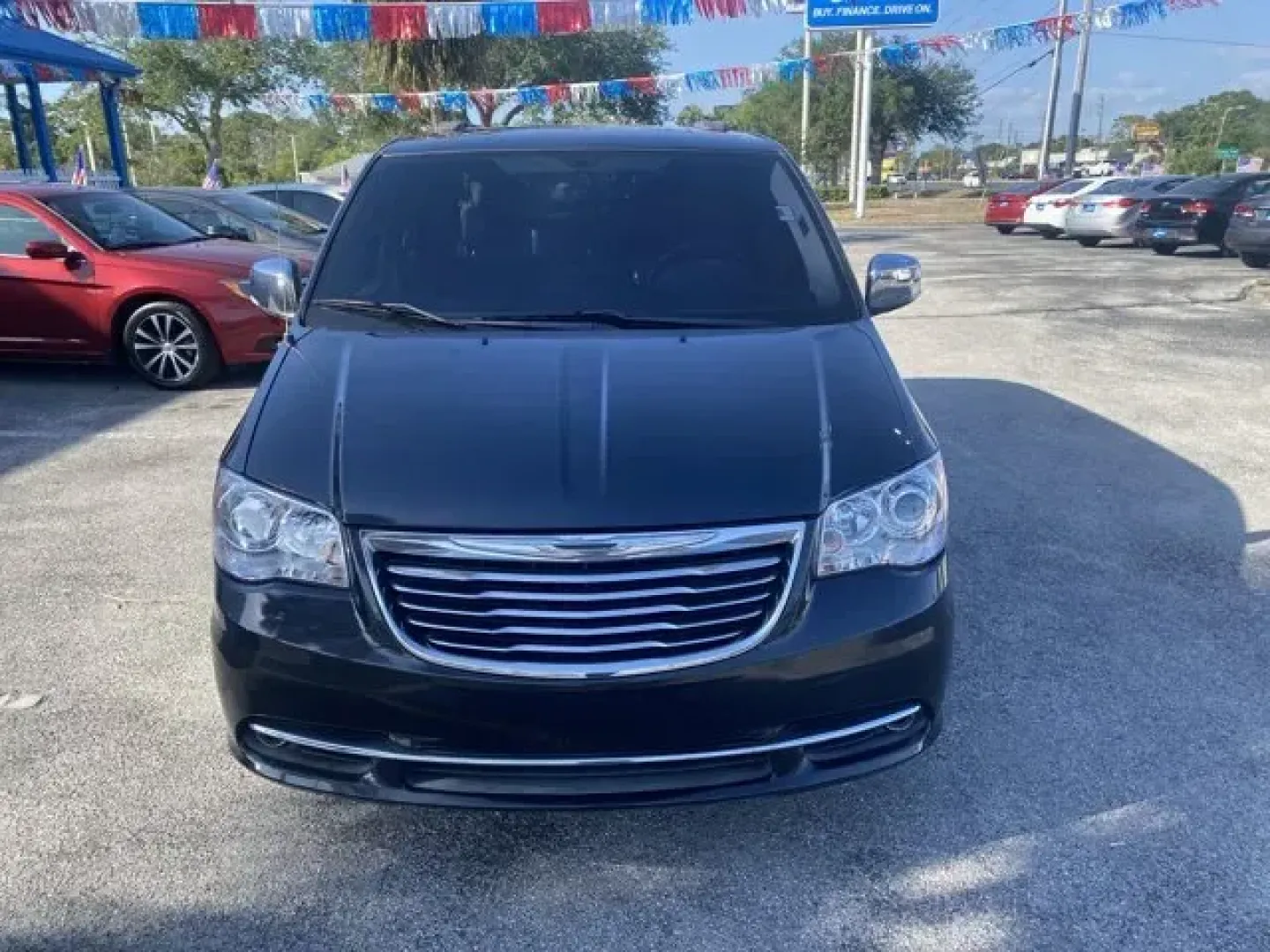 2013 Chrysler Town and Country (2C4RC1GG1DR) with an Other engine, AUTOMATIC transmission, located at 8829 US Hwy 19, Port Richey, FL, 34668, (727) 264-1107, 28.285917, -82.717346 - Ward's 10 Best Engines. Scores 25 Highway MPG and 17 City MPG! This Chrysler Town and Country delivers a Gas V6 3.6L/220 engine powering this Automatic transmission. P225/65R17 ALL-SEASON BSW TIRES (STD), MAXIMUM STEEL METALLIC, LUXURY GROUP -inc: load leveling and height control, pwr sunroof, pwr - Photo#0