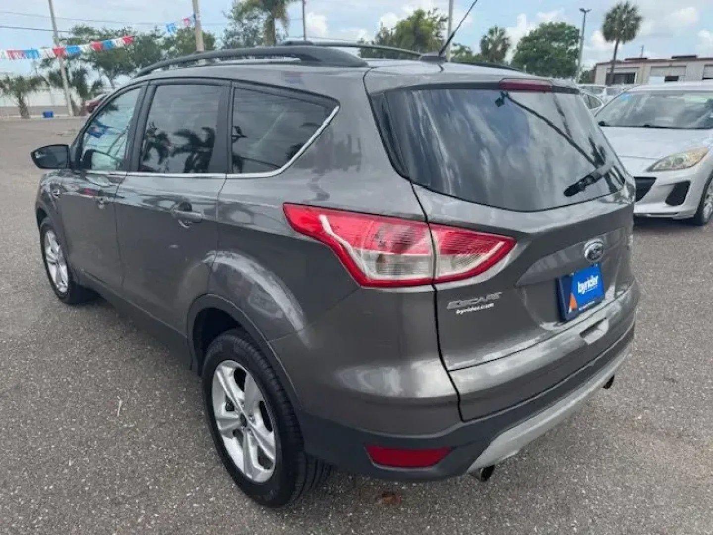 2013 Ford Escape (1FMCU0G96DU) with an Other engine, AUTOMATIC transmission, located at 7701 Park Blvd., Pinellas Park, FL, 33781, (727) 369-7777, 27.839552, -82.747284 - Ward's 10 Best Engines. Only 123,005 Miles! Boasts 30 Highway MPG and 22 City MPG! This Ford Escape delivers a Turbocharged Gas I4 2.0L/121 engine powering this Automatic transmission. Wheel nut wrench and jack, Variable intermittent windshield wipers, Urethane tilt/telescoping steering wheel w/sp - Photo#3