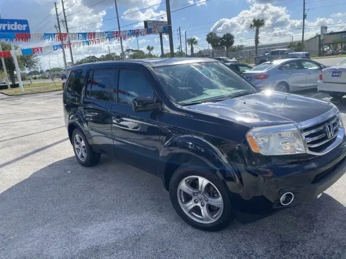 2013 Honda Pilot (5FNYF3H41DB) with an Other engine, AUTOMATIC transmission, located at 8829 US Hwy 19, Port Richey, FL, 34668, (727) 264-1107, 28.285917, -82.717346 - **Explore the Open Road with the 2013 Honda Pilot Your Perfect Family SUV Awaits!**<br /> <br /> Are you ready to elevate your family's adventures? The 2013 Honda Pilot is the ultimate SUV designed for growing families, weekend getaways, and everyday versatility. With its spacious interior, advance - Photo#2