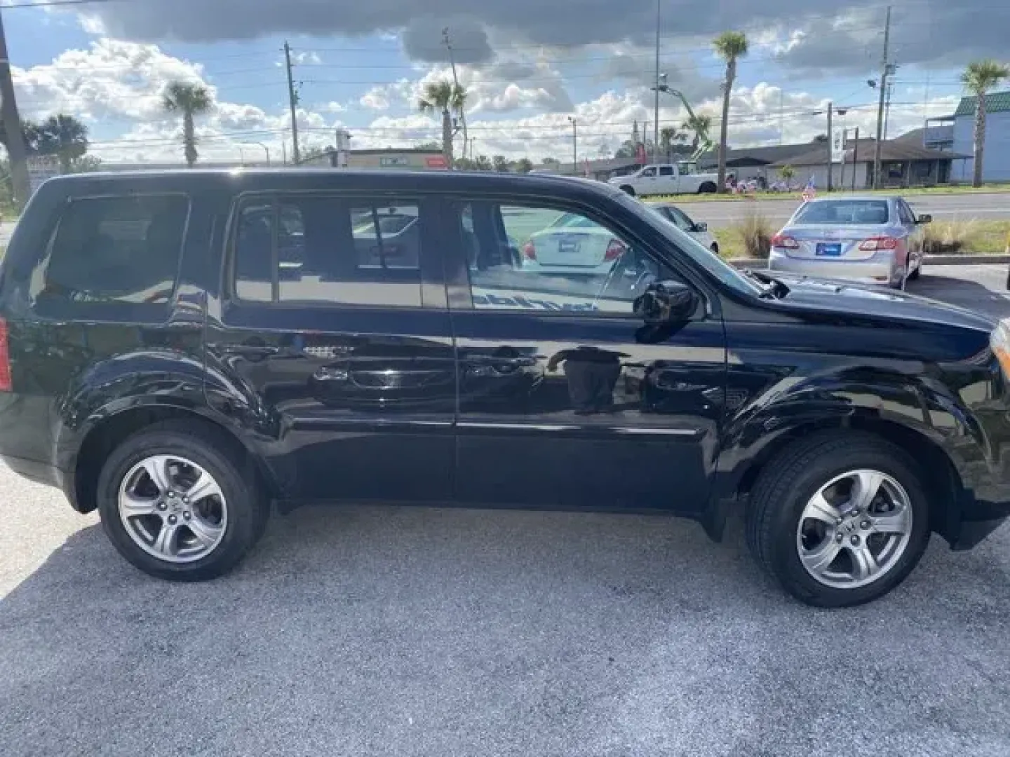 2013 Honda Pilot (5FNYF3H41DB) with an Other engine, AUTOMATIC transmission, located at 8829 US Hwy 19, Port Richey, FL, 34668, (727) 264-1107, 28.285917, -82.717346 - **Explore the Open Road with the 2013 Honda Pilot Your Perfect Family SUV Awaits!**<br /> <br /> Are you ready to elevate your family's adventures? The 2013 Honda Pilot is the ultimate SUV designed for growing families, weekend getaways, and everyday versatility. With its spacious interior, advance - Photo#3