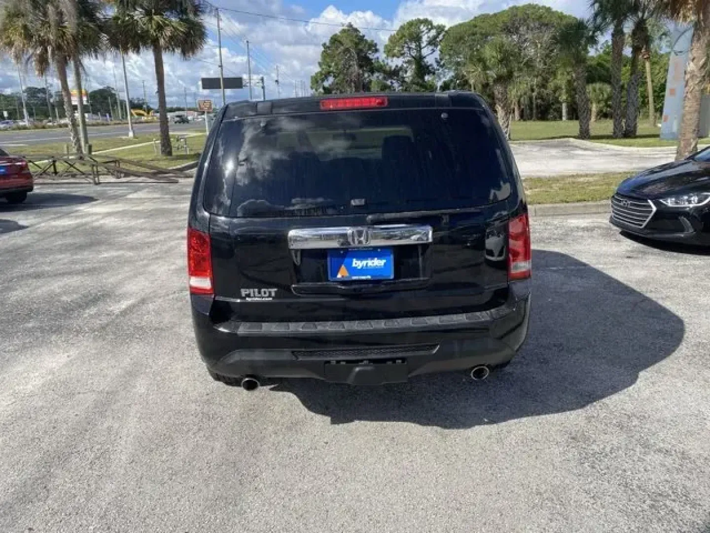 2013 Honda Pilot (5FNYF3H41DB) with an Other engine, AUTOMATIC transmission, located at 8829 US Hwy 19, Port Richey, FL, 34668, (727) 264-1107, 28.285917, -82.717346 - **Explore the Open Road with the 2013 Honda Pilot Your Perfect Family SUV Awaits!**<br /> <br /> Are you ready to elevate your family's adventures? The 2013 Honda Pilot is the ultimate SUV designed for growing families, weekend getaways, and everyday versatility. With its spacious interior, advance - Photo#4