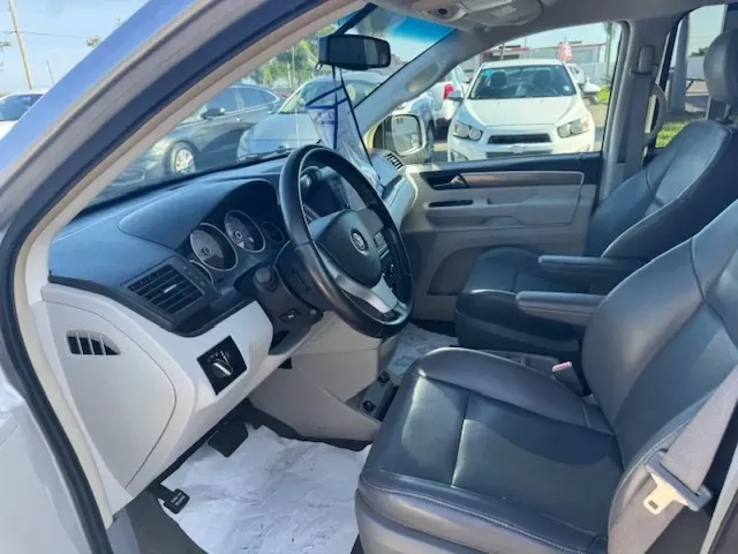 2010 Volkswagen Routan (2V4RW3D1XAR) with an Other engine, AUTOMATIC transmission, located at 7701 Park Blvd., Pinellas Park, FL, 33781, (727) 369-7777, 27.839552, -82.747284 - Discover your next adventure with the 2010 Volkswagen Routan, a versatile and spacious van perfect for growing families or weekend road trips. Whether you're planning a day at the beach or simply need a reliable vehicle for long commutes, this well-maintained Routan combines comfort, utility, and st - Photo#5