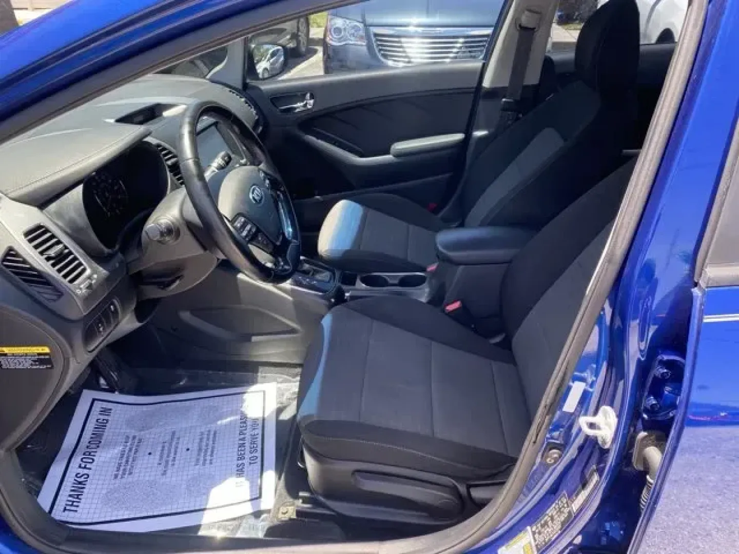 2018 Kia Forte (3KPFL4A73JE) with an Other engine, AUTOMATIC transmission, located at 8829 US Hwy 19, Port Richey, FL, 34668, (727) 264-1107, 28.285917, -82.717346 - Scores 37 Highway MPG and 25 City MPG! This Kia Forte boasts a Regular Unleaded I-4 2.0 L/122 engine powering this Automatic transmission. CARPETED FLOOR MATS, CARGO NET, CARGO MAT.*This Kia Forte Comes Equipped with These Options *BLACK, KNIT and WOVEN CLOTH SEAT TRIM, Window Grid Antenna, Vinyl - Photo#6