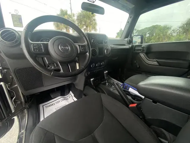 2018 Jeep Wrangler (1C4AJWAG4JL) with an Other engine, AUTOMATIC transmission, located at 1285 Cassat Ave, Jacksonville, FL, 32205, (904) 425-3000, 30.299780, -81.732430 - Are you ready to tackle the open road and embrace adventure? Look no further than this stunning 2018 Jeep Wrangler JK, the perfect vehicle for those who crave both thrill and versatility. Whether you're a weekend warrior looking for off-road capabilities or a daily commuter wanting a stylish ride, t- Photo#4