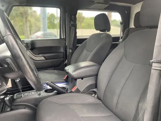 2018 Jeep Wrangler (1C4AJWAG4JL) with an Other engine, AUTOMATIC transmission, located at 1285 Cassat Ave, Jacksonville, FL, 32205, (904) 425-3000, 30.299780, -81.732430 - Are you ready to tackle the open road and embrace adventure? Look no further than this stunning 2018 Jeep Wrangler JK, the perfect vehicle for those who crave both thrill and versatility. Whether you're a weekend warrior looking for off-road capabilities or a daily commuter wanting a stylish ride, t- Photo#5