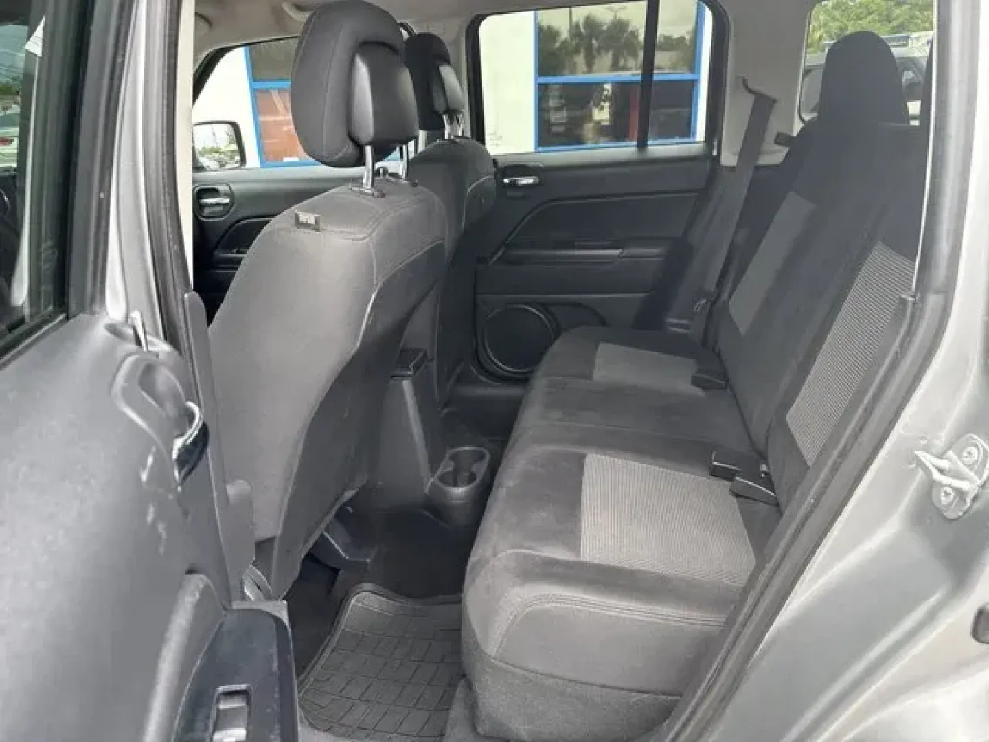 2014 Jeep Patriot (1C4NJPBA1ED) with an Other engine, AUTOMATIC transmission, located at 1285 Cassat Ave, Jacksonville, FL, 32205, (904) 425-3000, 30.299780, -81.732430 - KBB.com 5-Year Cost to Own Awards. This Jeep Patriot boasts a Regular Unleaded I-4 2.0 L/122 engine powering this Automatic transmission. ENGINE: 2.0L I4 DOHC 16V DUAL VVT (STD), Variable intermittent wipers, Touring suspension.*This Jeep Patriot Comes Equipped with These Options *Strut Front Suspen - Photo#10