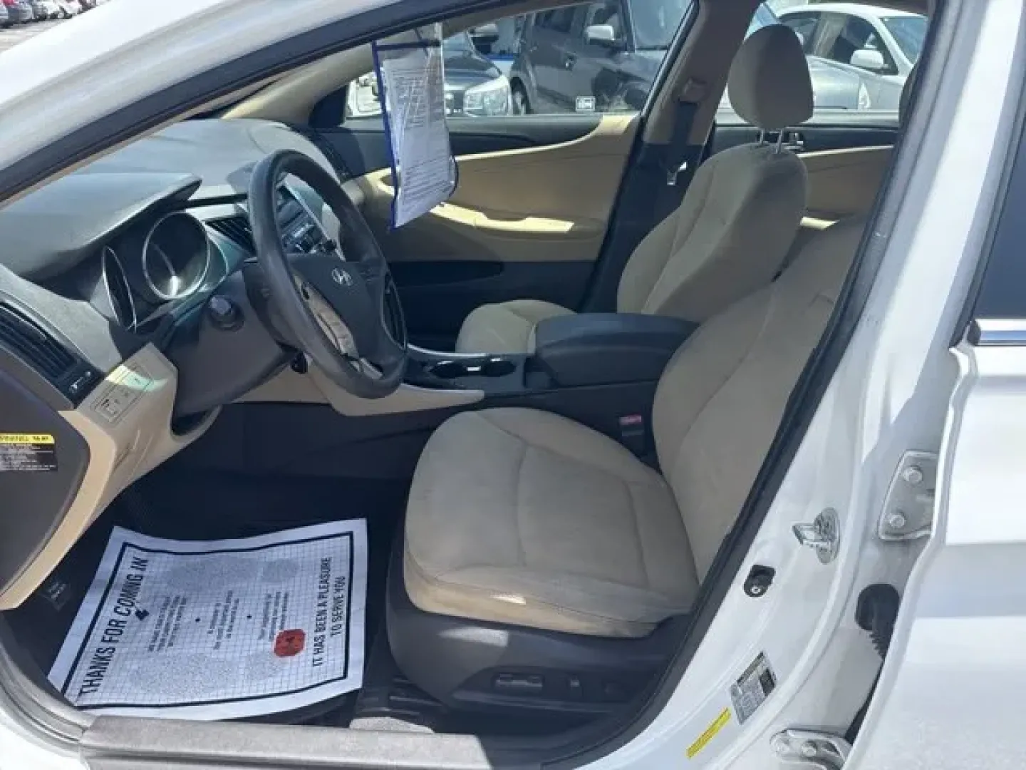 2012 Hyundai Sonata (5NPEB4AC6CH) with an Other engine, AUTOMATIC transmission, located at 1285 Cassat Ave, Jacksonville, FL, 32205, (904) 425-3000, 30.299780, -81.732430 - Are you searching for a reliable sedan that fits seamlessly into your lifestyle? Look no further than this stunning 2012 Hyundai Sonata, available now at Byrider Florida #139 in Jacksonville, FL. With its sleek Shimmering White exterior and comfortable interior, this vehicle is perfect for daily com - Photo#9