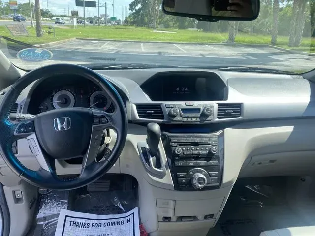 2012 Honda Odyssey (5FNRL5H9XCB) with an Other engine, AUTOMATIC transmission, located at 8829 US Hwy 19, Port Richey, FL, 34668, (727) 264-1107, 28.285917, -82.717346 - **Discover Your Family Adventure with the 2012 Honda Odyssey at Byrider Florida #162!**<br /> <br /> Are you ready to elevate your family outings and daily commutes? The 2012 Honda Odyssey, available now at Byrider Florida #162 in Port Richey, FL, is the perfect vehicle for growing families or anyon - Photo#9