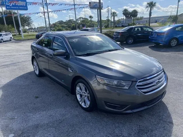 2014 Ford Taurus (1FAHP2E80EG) with an Other engine, AUTOMATIC transmission, located at 8829 US Hwy 19, Port Richey, FL, 34668, (727) 264-1107, 28.285917, -82.717346 - **Experience the Perfect Blend of Style and Performance with This 2014 Ford Taurus!**<br /> <br /> Are you searching for a reliable vehicle that seamlessly fits into your busy lifestyle? Whether you're commuting to work, shuttling kids around, or embarking on a weekend adventure, the 2014 Ford Tauru - Photo#2