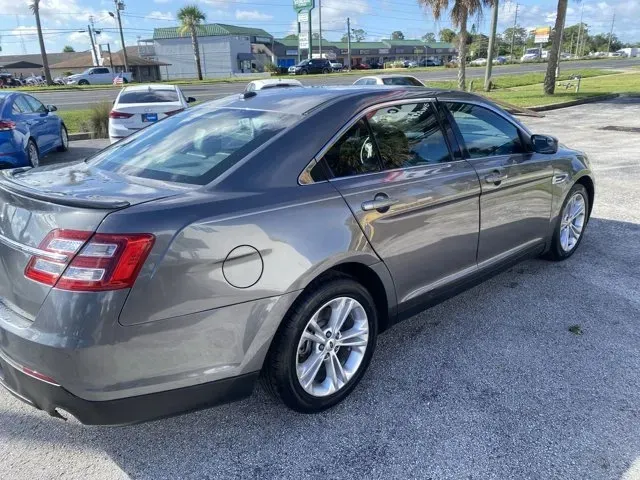 2014 Ford Taurus (1FAHP2E80EG) with an Other engine, AUTOMATIC transmission, located at 8829 US Hwy 19, Port Richey, FL, 34668, (727) 264-1107, 28.285917, -82.717346 - **Experience the Perfect Blend of Style and Performance with This 2014 Ford Taurus!**<br /> <br /> Are you searching for a reliable vehicle that seamlessly fits into your busy lifestyle? Whether you're commuting to work, shuttling kids around, or embarking on a weekend adventure, the 2014 Ford Tauru - Photo#3