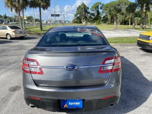 2014 Ford Taurus (1FAHP2E80EG) with an Other engine, AUTOMATIC transmission, located at 8829 US Hwy 19, Port Richey, FL, 34668, (727) 264-1107, 28.285917, -82.717346 - **Experience the Perfect Blend of Style and Performance with This 2014 Ford Taurus!**<br /> <br /> Are you searching for a reliable vehicle that seamlessly fits into your busy lifestyle? Whether you're commuting to work, shuttling kids around, or embarking on a weekend adventure, the 2014 Ford Tauru - Photo#4