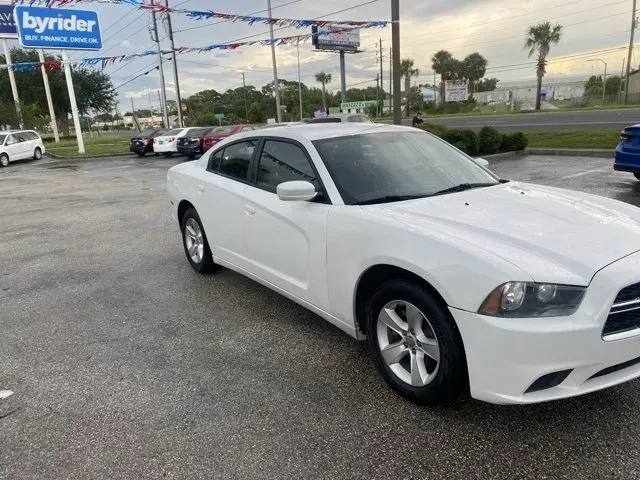 2014 Dodge Charger (2C3CDXBG1EH) with an Other engine, AUTOMATIC transmission, located at 8829 US Hwy 19, Port Richey, FL, 34668, (727) 264-1107, 28.285917, -82.717346 - Are you ready to elevate your driving experience? Picture this: you're gliding down the scenic roads of Port Richey, FL, with the sun setting over the Gulf of Mexico, in a powerful 2014 Dodge Charger. Whether you're commuting to work, running errands around town, or hitting the road for a weekend ad - Photo#2