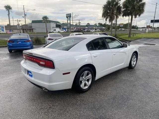 2014 Dodge Charger (2C3CDXBG1EH) with an Other engine, AUTOMATIC transmission, located at 8829 US Hwy 19, Port Richey, FL, 34668, (727) 264-1107, 28.285917, -82.717346 - Are you ready to elevate your driving experience? Picture this: you're gliding down the scenic roads of Port Richey, FL, with the sun setting over the Gulf of Mexico, in a powerful 2014 Dodge Charger. Whether you're commuting to work, running errands around town, or hitting the road for a weekend ad - Photo#3