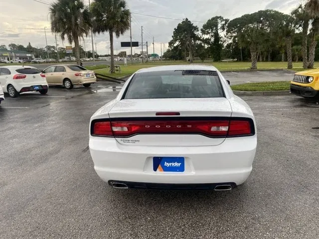 2014 Dodge Charger (2C3CDXBG1EH) with an Other engine, AUTOMATIC transmission, located at 8829 US Hwy 19, Port Richey, FL, 34668, (727) 264-1107, 28.285917, -82.717346 - Are you ready to elevate your driving experience? Picture this: you're gliding down the scenic roads of Port Richey, FL, with the sun setting over the Gulf of Mexico, in a powerful 2014 Dodge Charger. Whether you're commuting to work, running errands around town, or hitting the road for a weekend ad - Photo#4