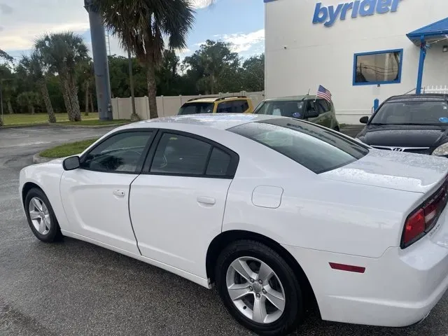 2014 Dodge Charger (2C3CDXBG1EH) with an Other engine, AUTOMATIC transmission, located at 8829 US Hwy 19, Port Richey, FL, 34668, (727) 264-1107, 28.285917, -82.717346 - Are you ready to elevate your driving experience? Picture this: you're gliding down the scenic roads of Port Richey, FL, with the sun setting over the Gulf of Mexico, in a powerful 2014 Dodge Charger. Whether you're commuting to work, running errands around town, or hitting the road for a weekend ad - Photo#5